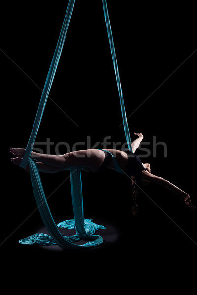 Young woman gymnast with blue gymnastic ribbon Stock photo © zastavkin