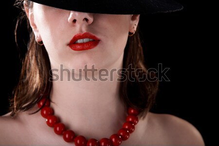 Gyönyörű lány piros chilli bors közelkép portré Stock fotó © zastavkin