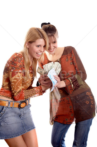 Girls with envelope and money Stock photo © zastavkin