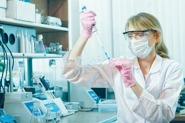 woman scientist in laboratory Stock photo © zastavkin