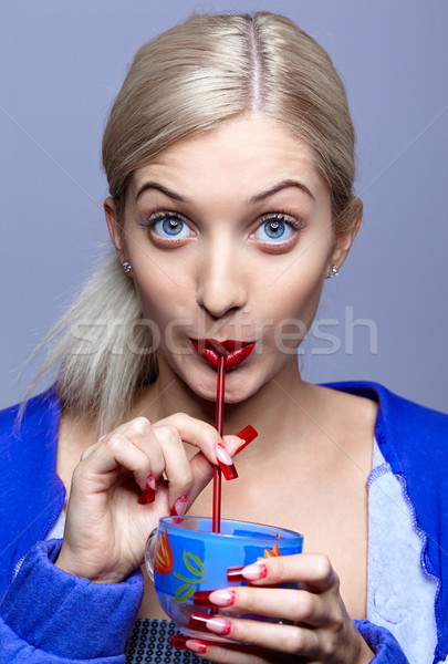 Stock photo: Drinking woman