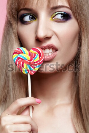 beautiful model with lollipop Stock photo © zastavkin