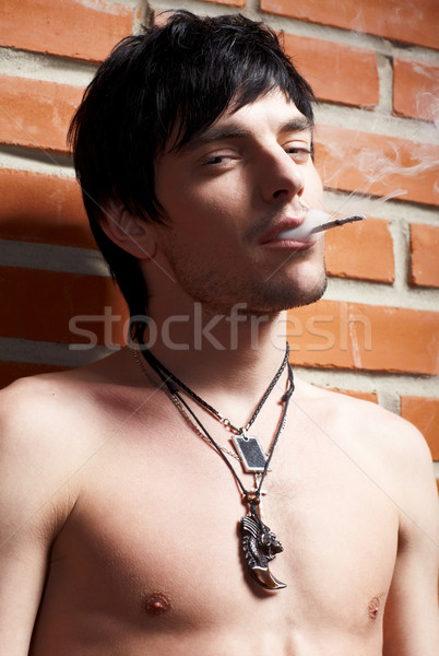 man near brick wall Stock photo © zastavkin