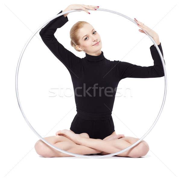 Stock photo: blonde gymnast with hula hoop