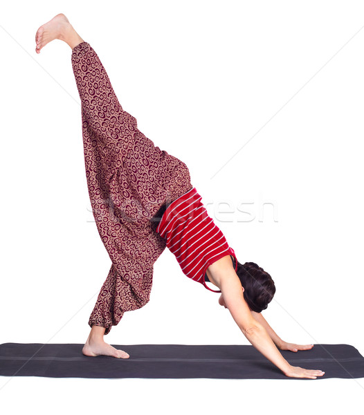 yoga excercising eka pada adho mukha shvanasana pose Stock photo © zastavkin