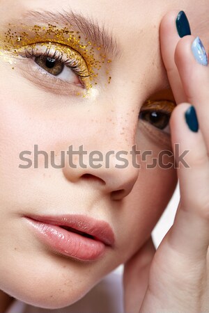 Złoty makijaż oczu shot kobiet twarz Zdjęcia stock © zastavkin