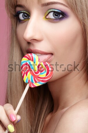 beautiful model with lollipop Stock photo © zastavkin