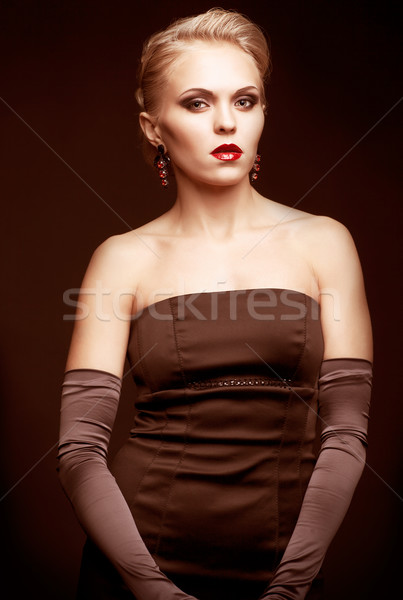 Blonde woman in black dress Stock photo © zastavkin
