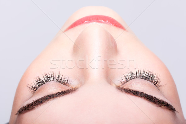 Female closed eye and brows with day makeup Stock photo © zastavkin