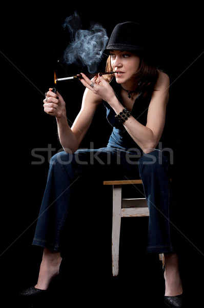 Woman with cigarette holder Stock photo © zastavkin