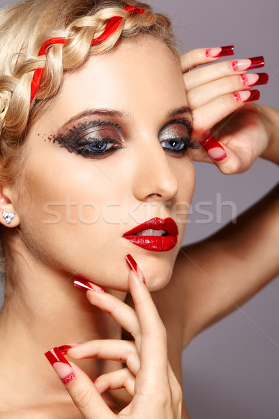 Young woman with red nails Stock photo © zastavkin