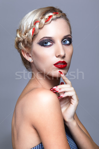 Young woman with red nails Stock photo © zastavkin