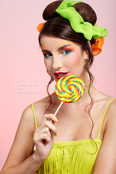 beautiful model with lollipop Stock photo © zastavkin