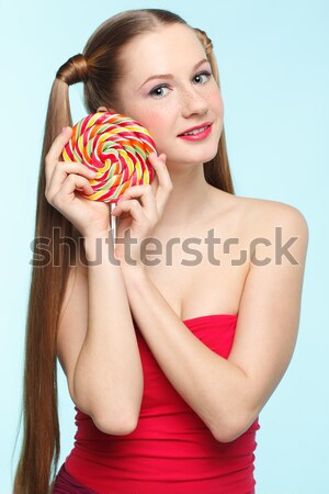 beautiful model with lollipop Stock photo © zastavkin