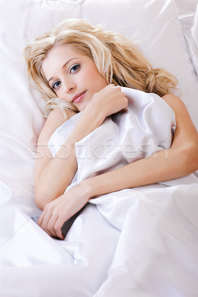 beautiful girl in bedroom Stock photo © zastavkin