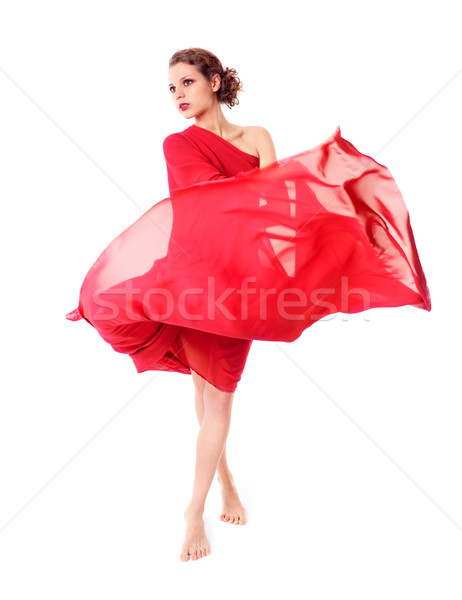 Gyönyörű nő piros repülés ruha izolált fehér Stock fotó © zastavkin