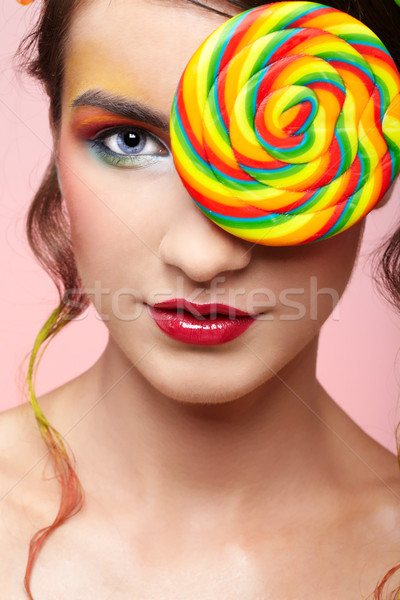 beautiful model with lollipop Stock photo © zastavkin