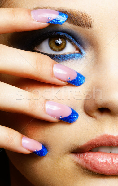 Gyönyörű barna hajú közelkép portré kék szem Stock fotó © zastavkin