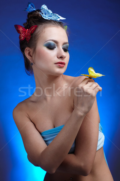 Girl with butterfly  Stock photo © zastavkin