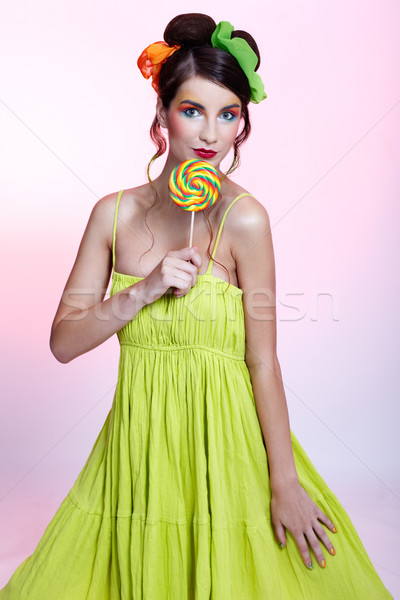 beautiful model with lollipop Stock photo © zastavkin