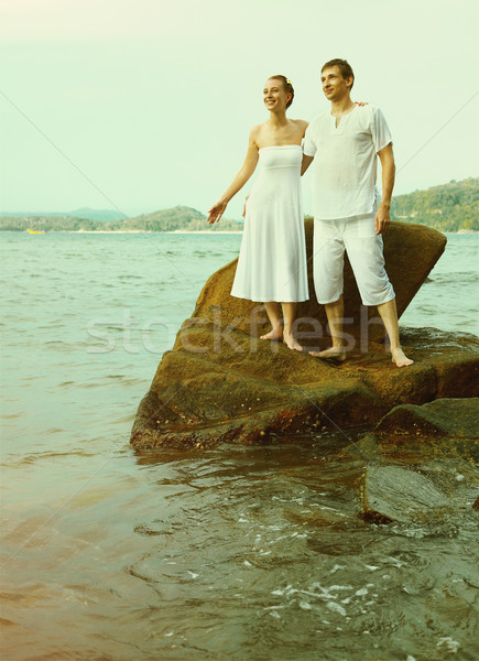 Instagram colorized vintage couple on beach portrait  Stock photo © zastavkin