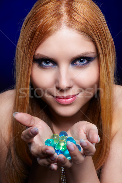 redhead girl with gel balls Stock photo © zastavkin