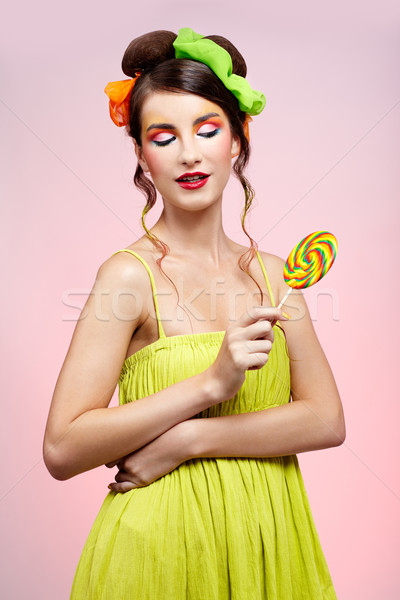 beautiful model with lollipop Stock photo © zastavkin