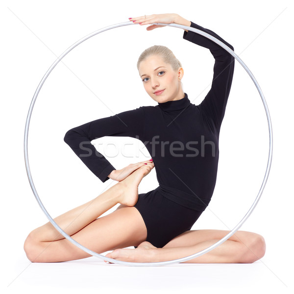 Stock photo: Blonde gymnast with hula hoop