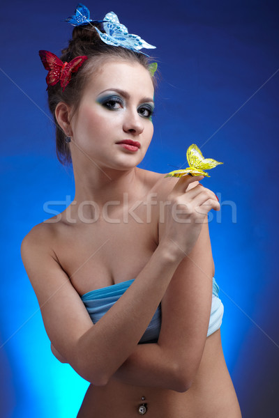 Girl with butterfly  Stock photo © zastavkin