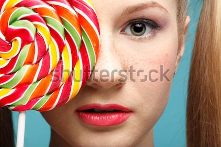 beautiful model with lollipop Stock photo © zastavkin