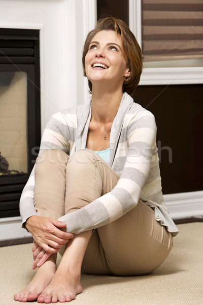 Nő nappali kaukázusi ül padló ház Stock fotó © zdenkam