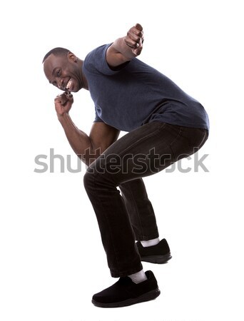 handsome black man thrilled with excitement Stock photo © zdenkam