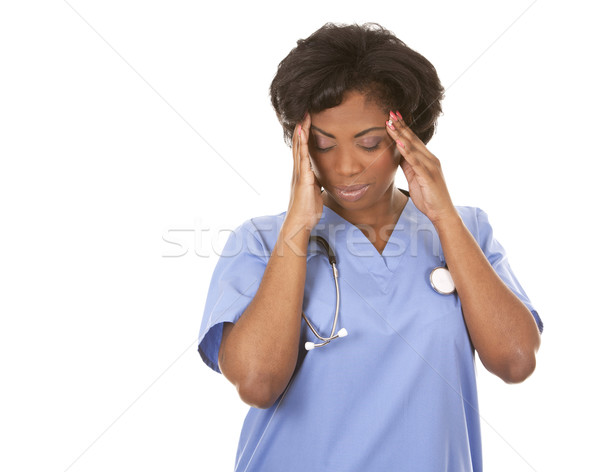 nurse having a headache Stock photo © zdenkam
