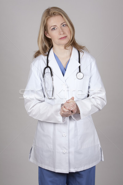 Femminile medico grigio medici Foto d'archivio © zdenkam