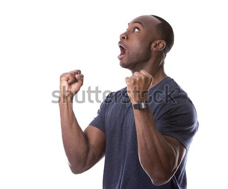 handsome black man thrilled with excitement Stock photo © zdenkam