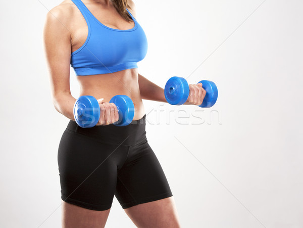 Femme de remise en forme fitness modèle brunette bleu [[stock_photo]] © zdenkam