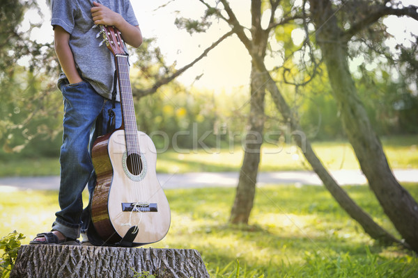 Anonyme peu garçon guitare parc extérieur [[stock_photo]] © zdenkam