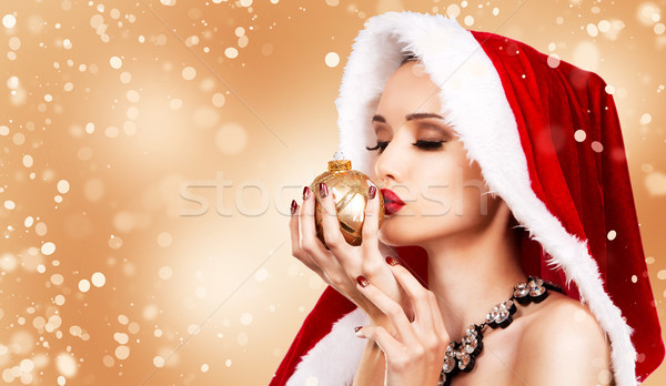 Gyönyörű karácsony nő előkelő mikulás tart Stock fotó © zdenkam