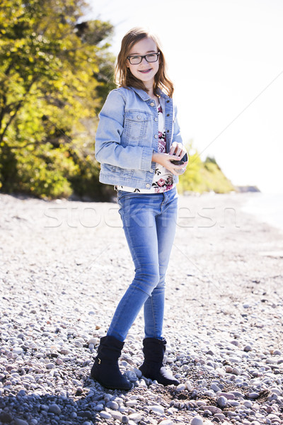 Lezser tinilány tengerpart fiatal tinédzser visel Stock fotó © zdenkam