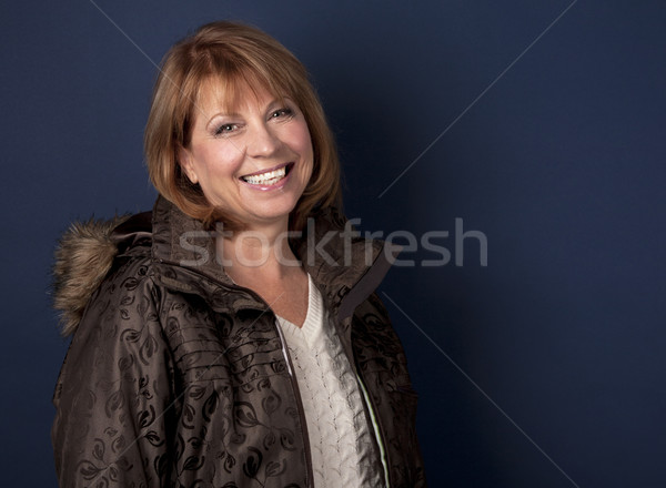 Winter vrouw rijpe vrouw jas donkere Stockfoto © zdenkam