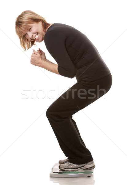 Vrouw permanente schaal rijpe vrouw gewicht witte Stockfoto © zdenkam