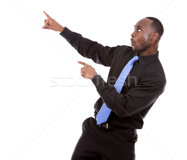 handsome black man pointing Stock photo © zdenkam