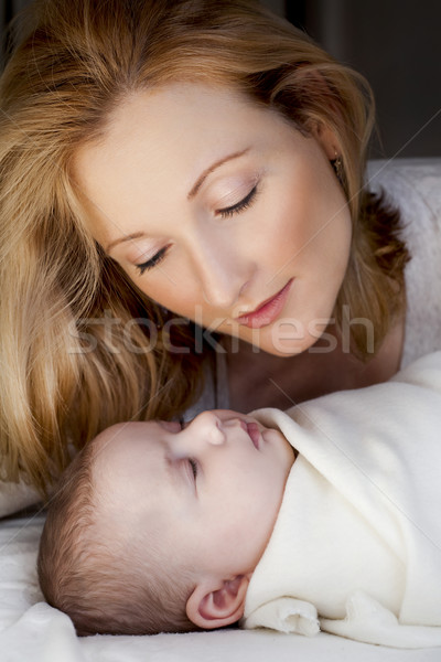 Mutter Baby blond jungen Hand Gesicht Stock foto © zdenkam