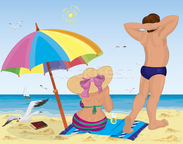 Married couple on the beach under umbrella Stock photo © Zebra-Finch