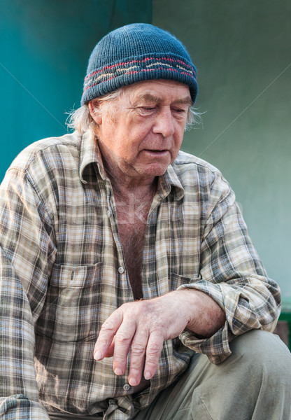 Seniors portrait of contemplative old caucasian man looking down Stock photo © zeffss