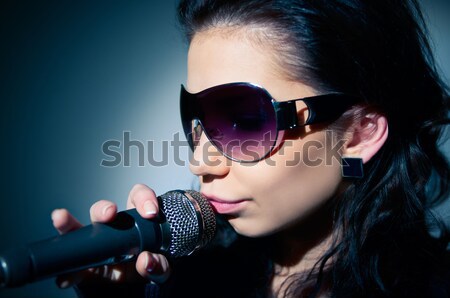 Stock photo: Portrait of a young girl in sunglasses