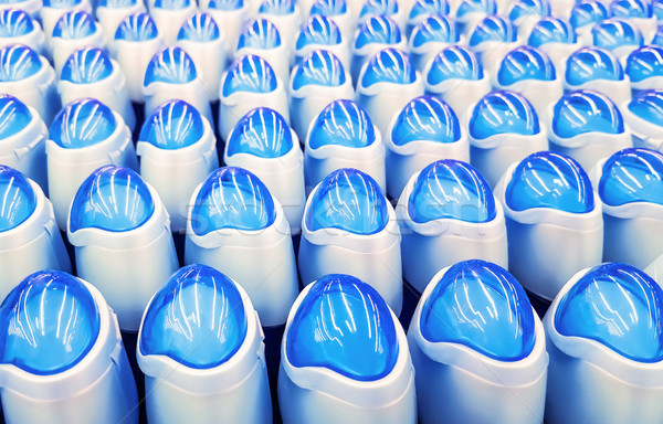 Deodorante bottiglie blu fila industria bottiglia Foto d'archivio © zeffss