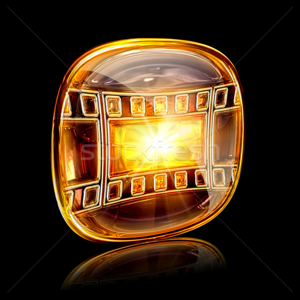 film icon amber, isolated on black background Stock photo © zeffss