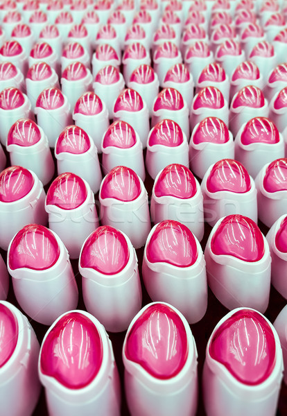 Deodorante bottiglie rosa fila industria bottiglia Foto d'archivio © zeffss