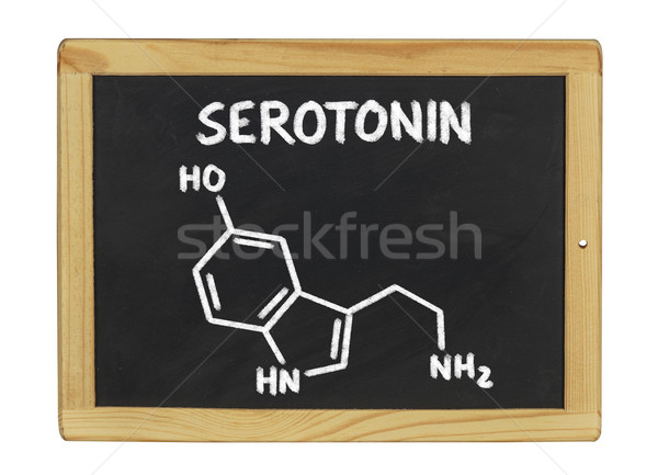 chemical formula of serotonin on a blackboard Stock photo © Zerbor